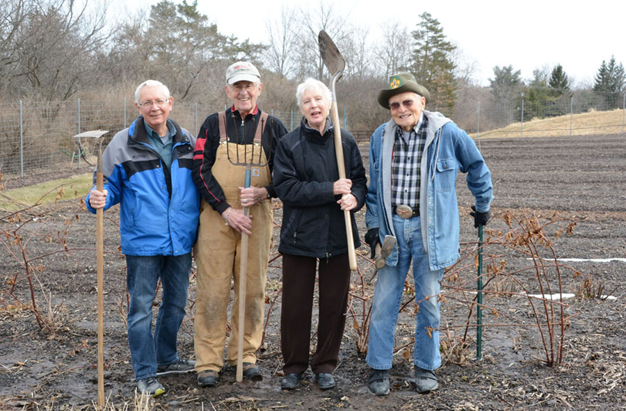 Kendal at Ithaca resident plant in retirement community garden