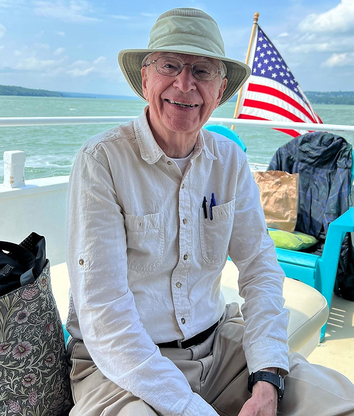 Kendal at Ithaca senior living resident on Finger Lake cruise in Ithaca, NY