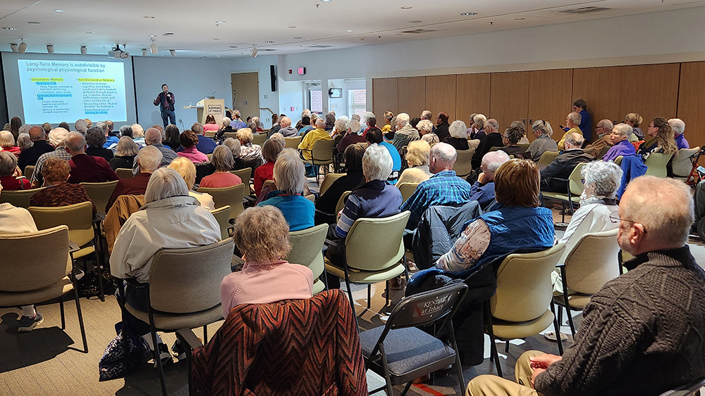 Senior lifelong learning participants listen to lecture